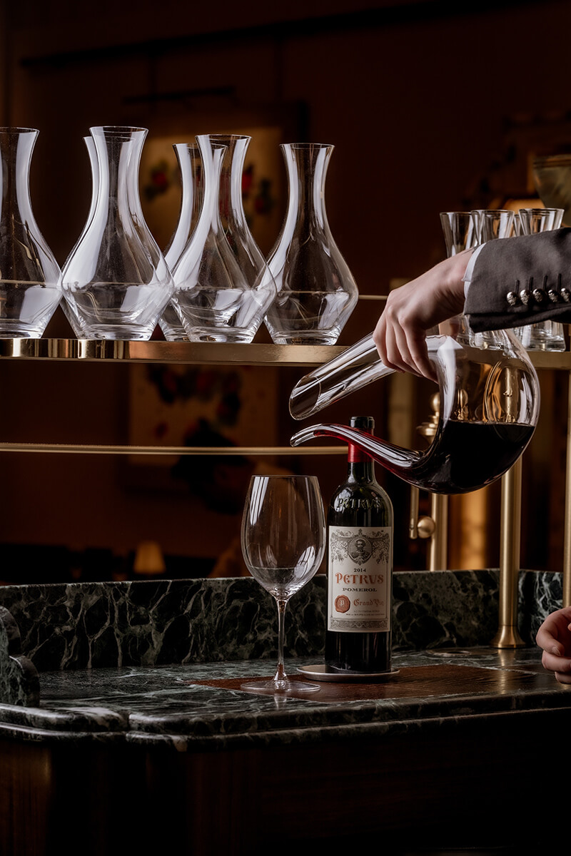 Sommelier pouring wine in Claridge's Restaurant